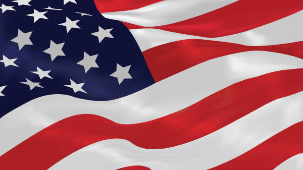 American flag waving strongly as a symbol of unity freedom sacrifice and the endurance of the United States